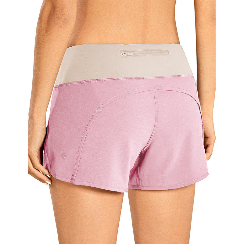 Dame Sporty shorts med højt talje lavet af åndbart materiale Stilla