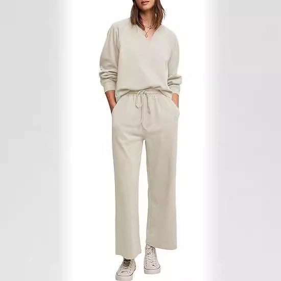Damer komfortabel V-udskæring jumpsuit med bredt ben og elastisk talje Stilla