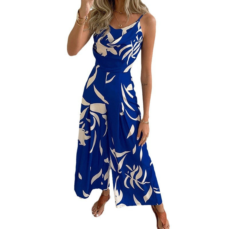 Dame jumpsuit med flydende snit og dekorative blomster motiver Stilla