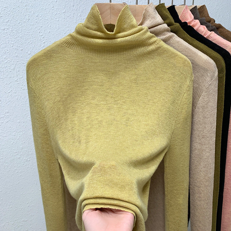 Dame rullekravepullover med fin ribstruktur og høj komfort Stilla