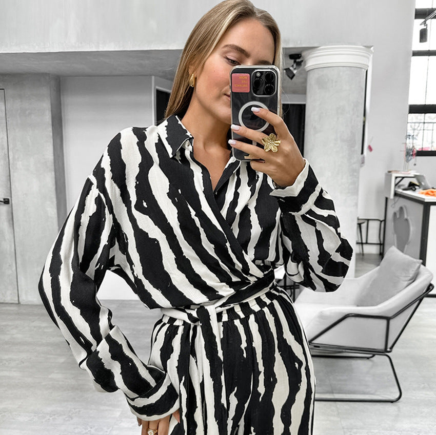Dame elegant jumpsuit med asymmetrisk krave og sidelænbånd Stilla