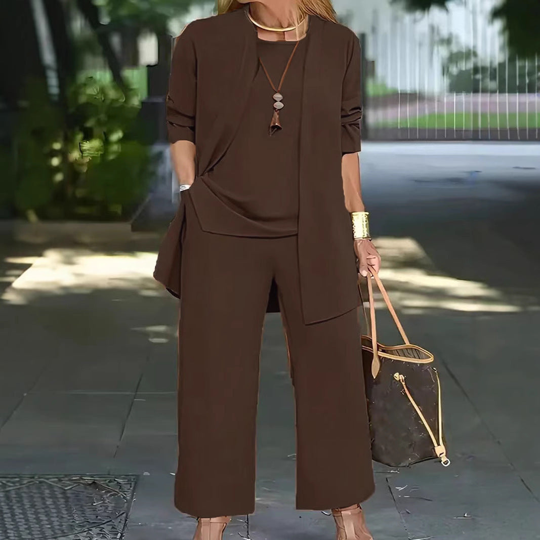 Dame Elegante og komfortabel todelt outfit med brede bukser og flydende top Stilla