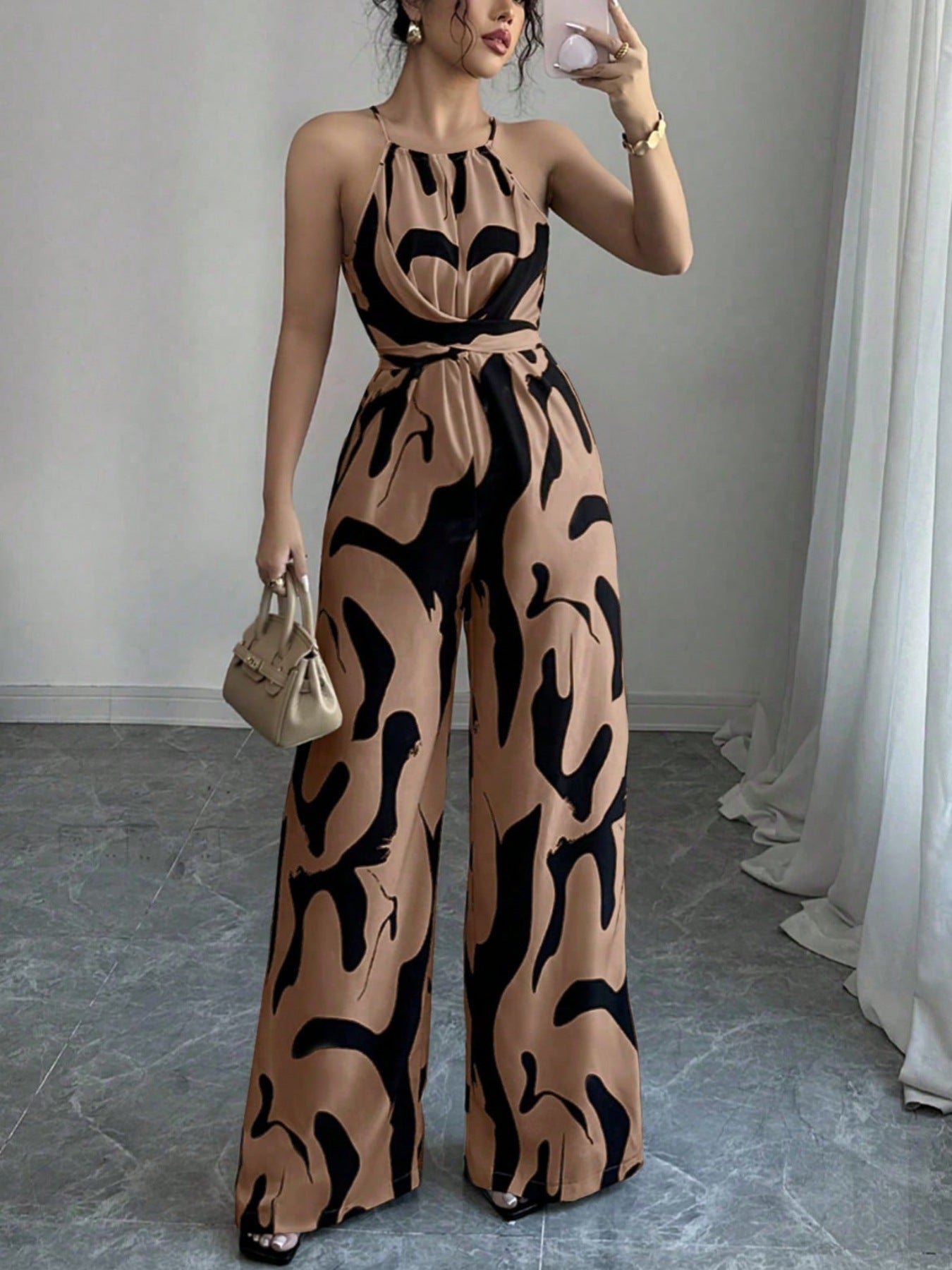 Dame jumpsuit med vidde ben og trendy mønster Stilla