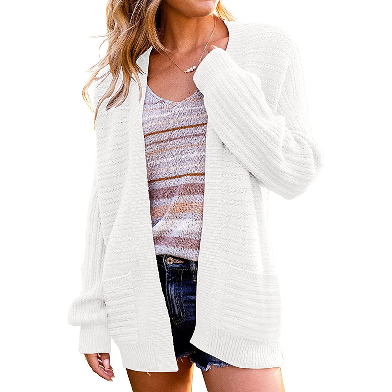 Dame strik cardigan med struktureret design og praktiske lommer Stilla