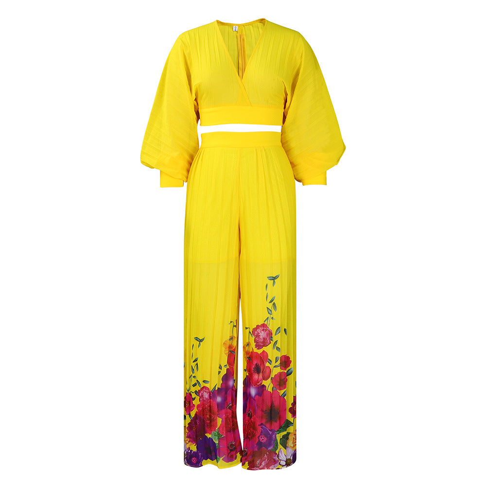 Dame let jumpsuit med elegante flæsekant og blomsterprint Stilla