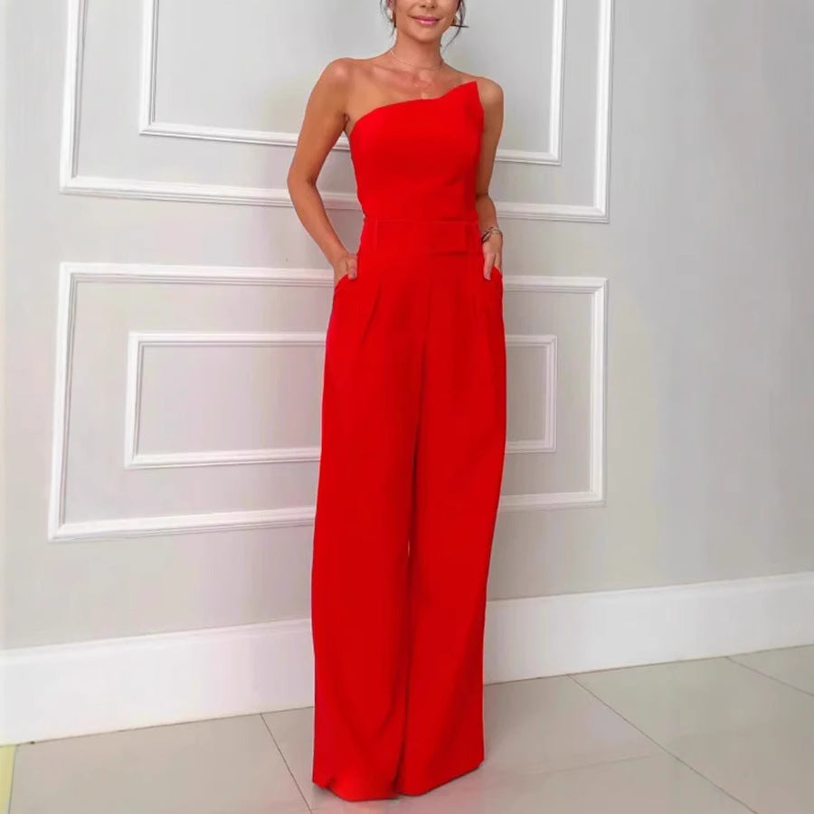 Dame Elegant jumpsuit med asymmetrisk skæring og bredt ben Stilla