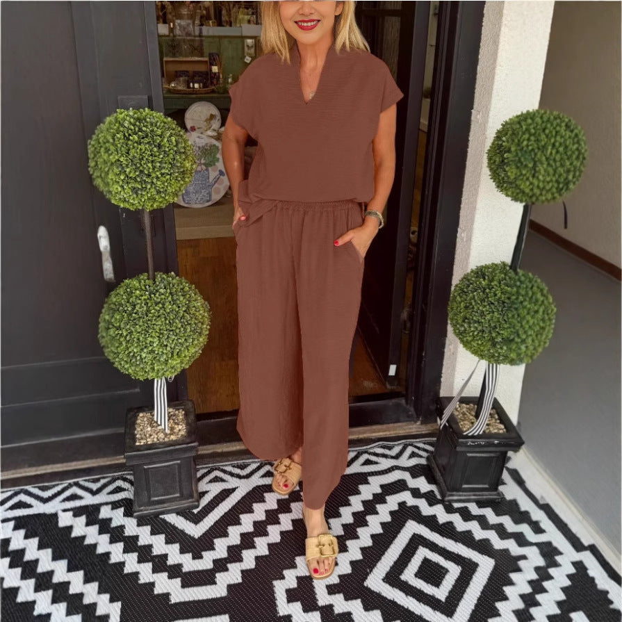 Dame jumpsuit med løs pasform og elegant V-udskæring Stilla