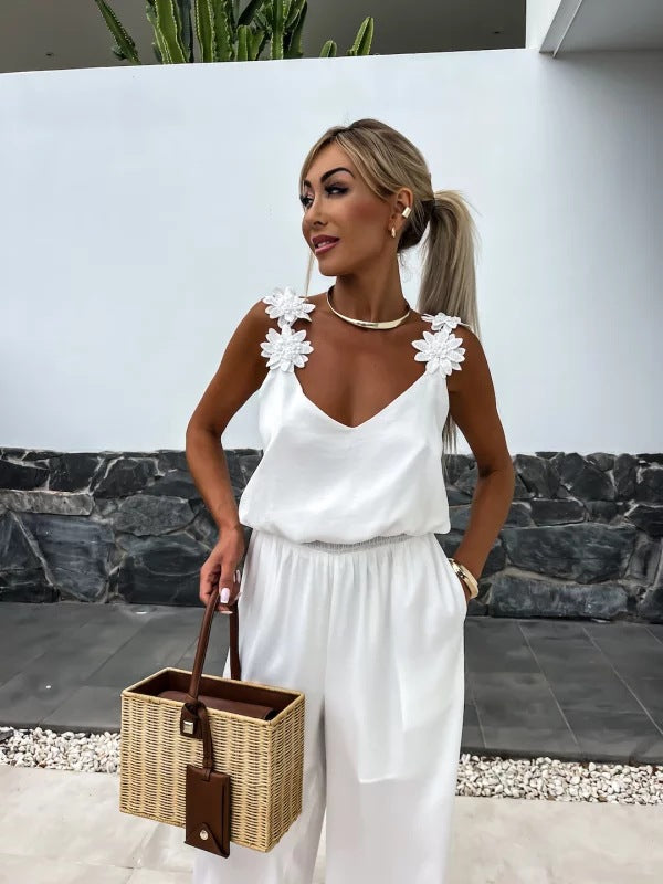 Dame løst skåret jumpsuit med floralt accent og elastisk talje Stilla