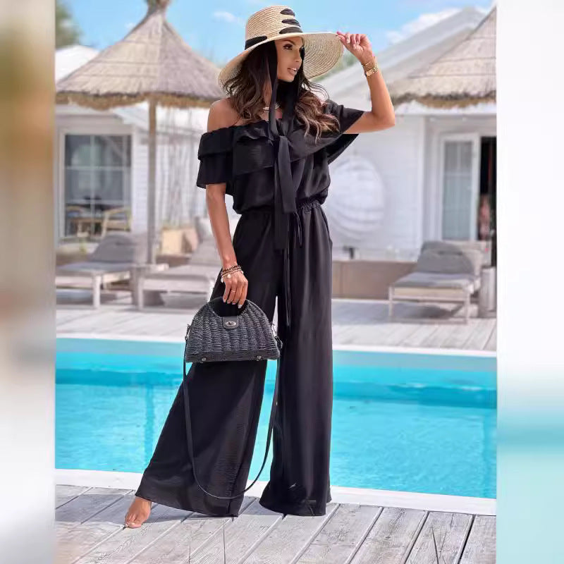 Dame jumpsuit med flydende snit og elastisk taljebånd Stilla