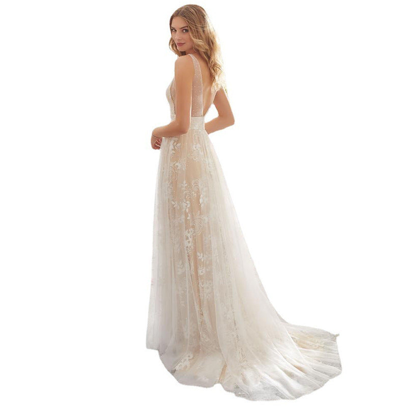 Dame Elegant brudekjole med blomsterapplikationer og gennemsigtig tylldrapering Stilla