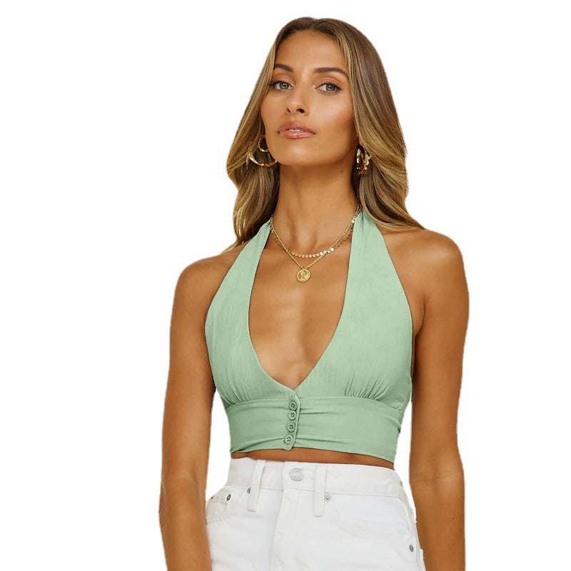 Dame cropped top med dyb udskæring og knapdetaljer Stilla