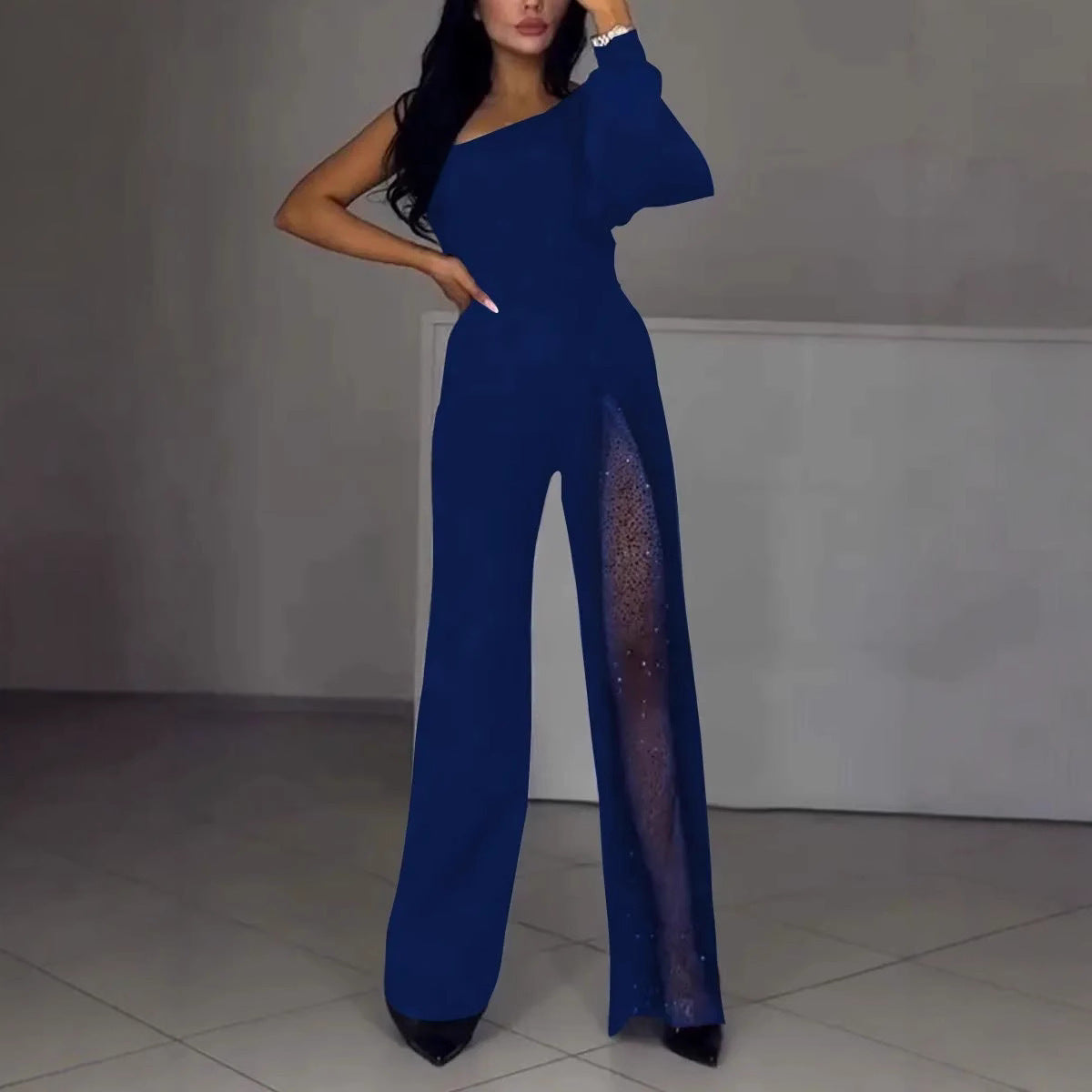 Dame elegant jumpsuit med gennemsigtig side og funkende detaljer Stiila