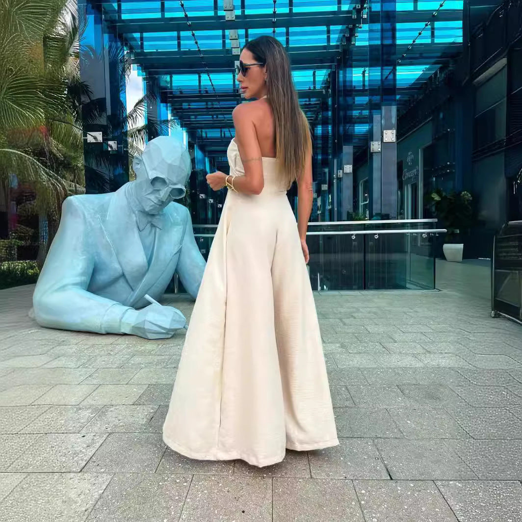 Dame jumpsuit med vidde ben og innovativ halterneck Stilla