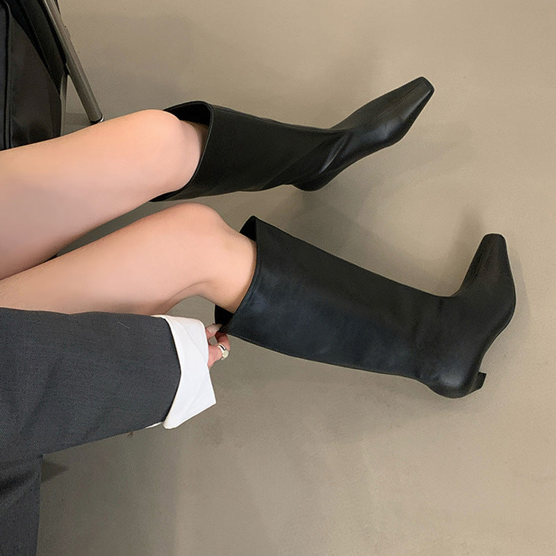 Dame støvler med elegant spids tå og struktureret design Stilla