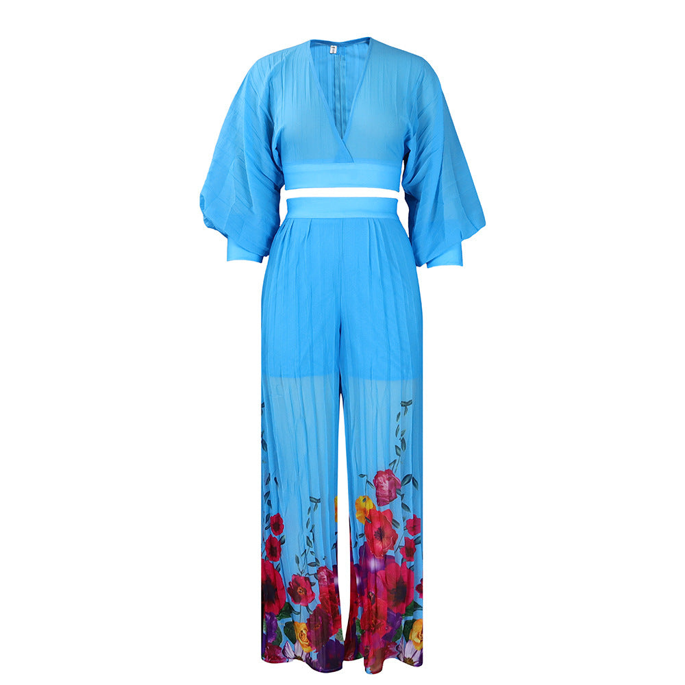 Dame let jumpsuit med elegante flæsekant og blomsterprint Stilla