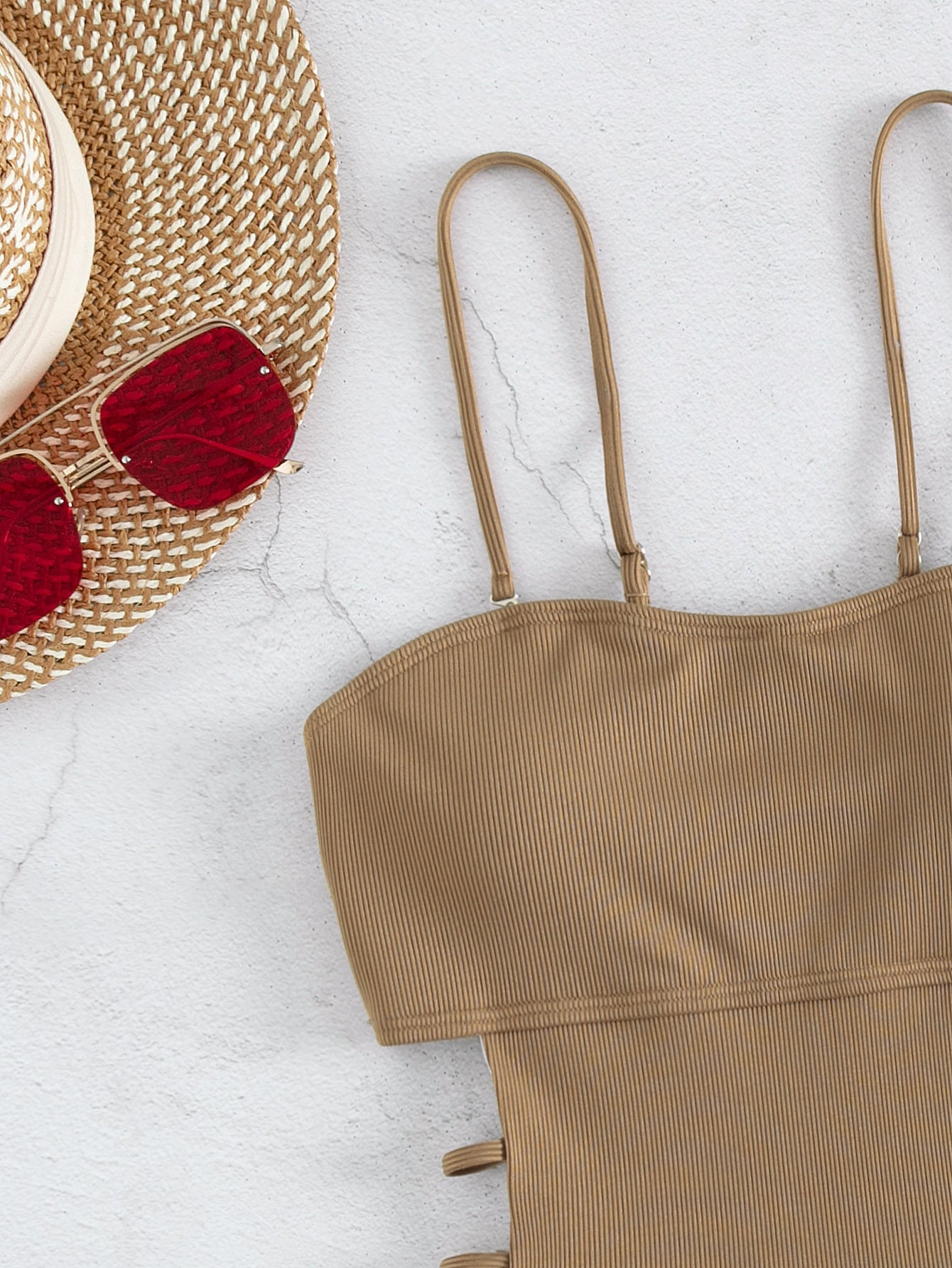 Dame jumpsuit badedragt med side cut-outs og justerbare spaghetti-stropper Stilla
