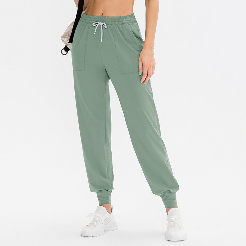 Dame Sporty Joggingbukser med praktiske lynlåslommer og fleksibel talje Stilla