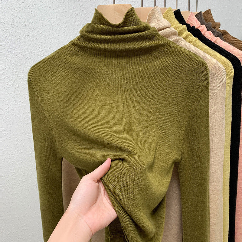 Dame rullekravepullover med fin ribstruktur og høj komfort Stilla