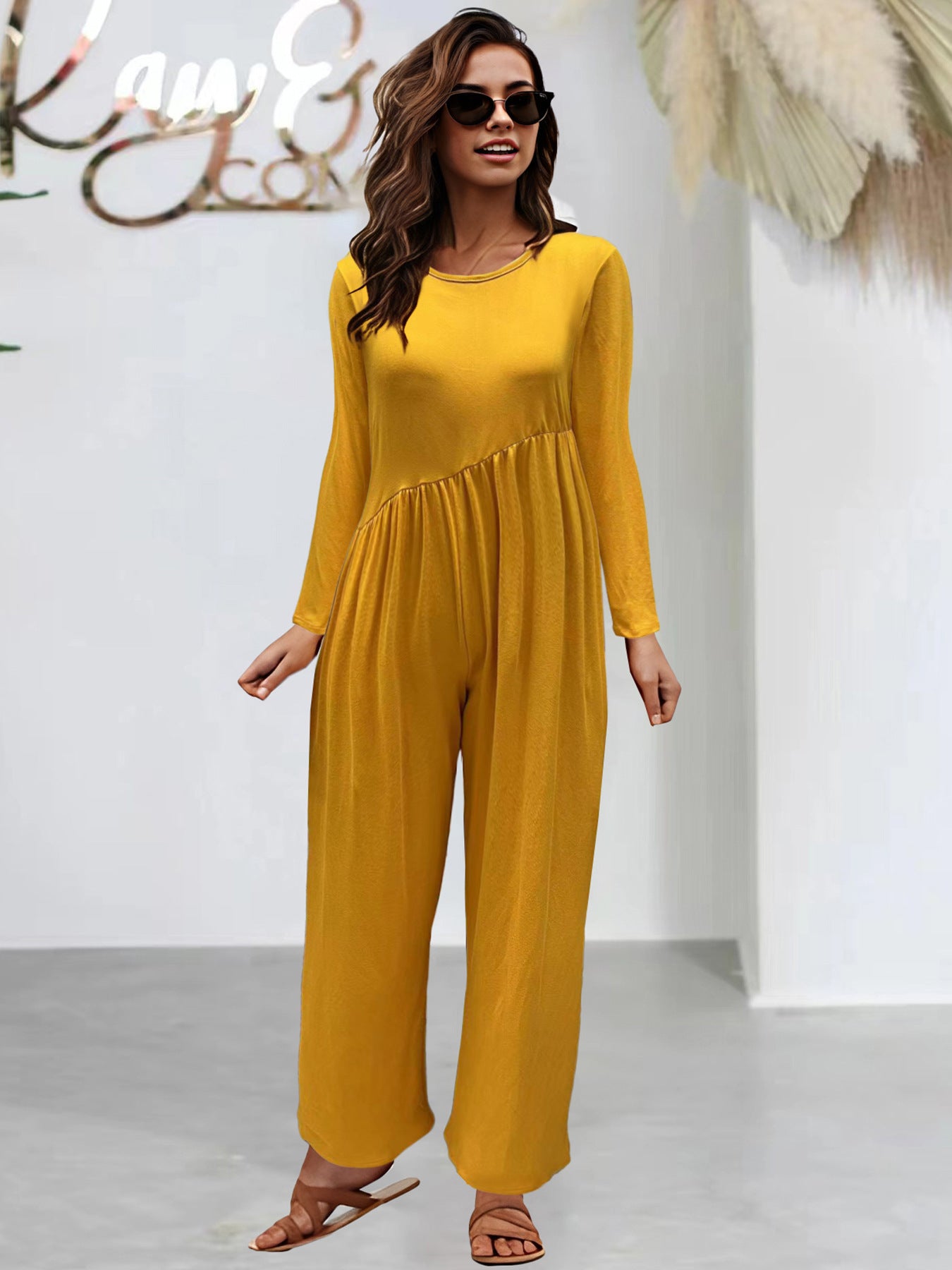 Dame overdimensioneret jumpsuit med sidelining og bredt ben Stilla