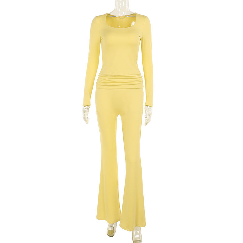 Dame Langærmet Jumpsuit med dyb Rundhalsudskæring og elegante Ruffle-detaljer Stilla