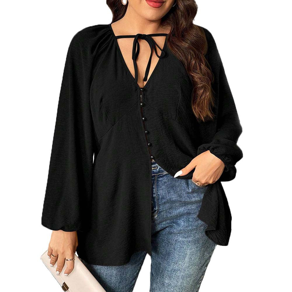 Dame elegant bluse med V-udskæring og dekorative knapdetaljer Stilla