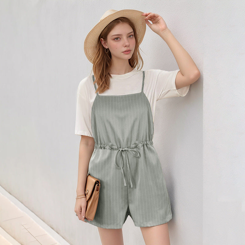 Dame jumpsuit med smart stribet look og justerbar talje snor Stilla