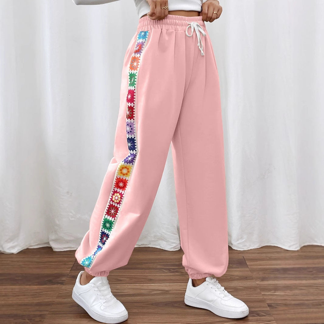 Dame joggingbukser med floral sidebånd Stilla