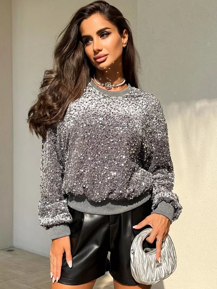 Dame Glitrende Pullover med oversized snit og funklende rhinsten Stilla