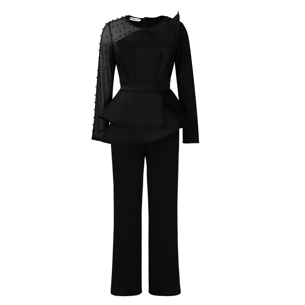 Dame Elegant Jumpsuit med asymmetrisk design og voluminøs peplum Stilla