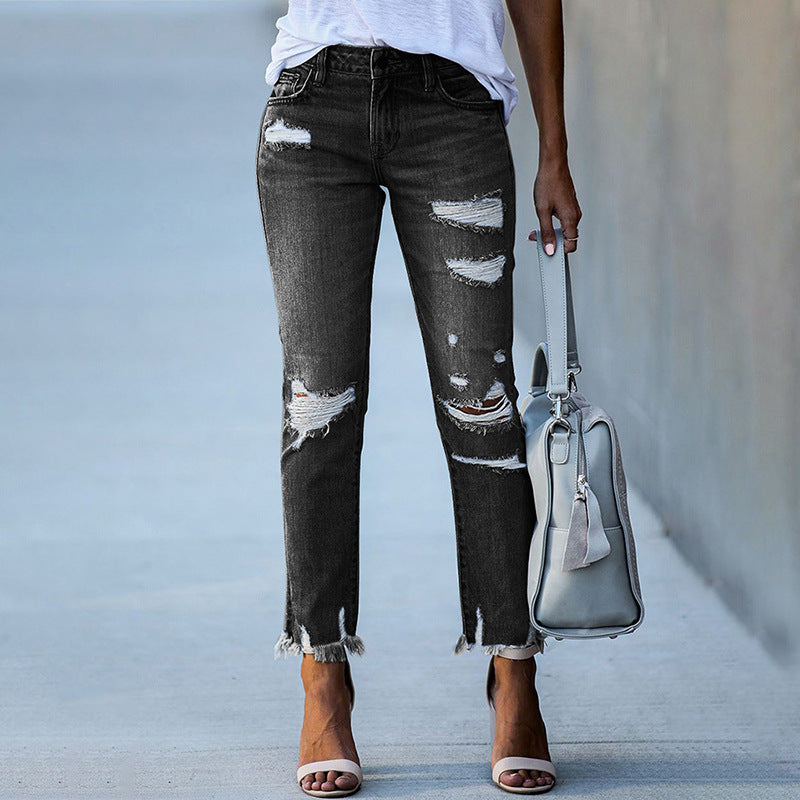 Dame Destroyed Jeans i moderne Boyfriend-stil med frynset kanter Stilla