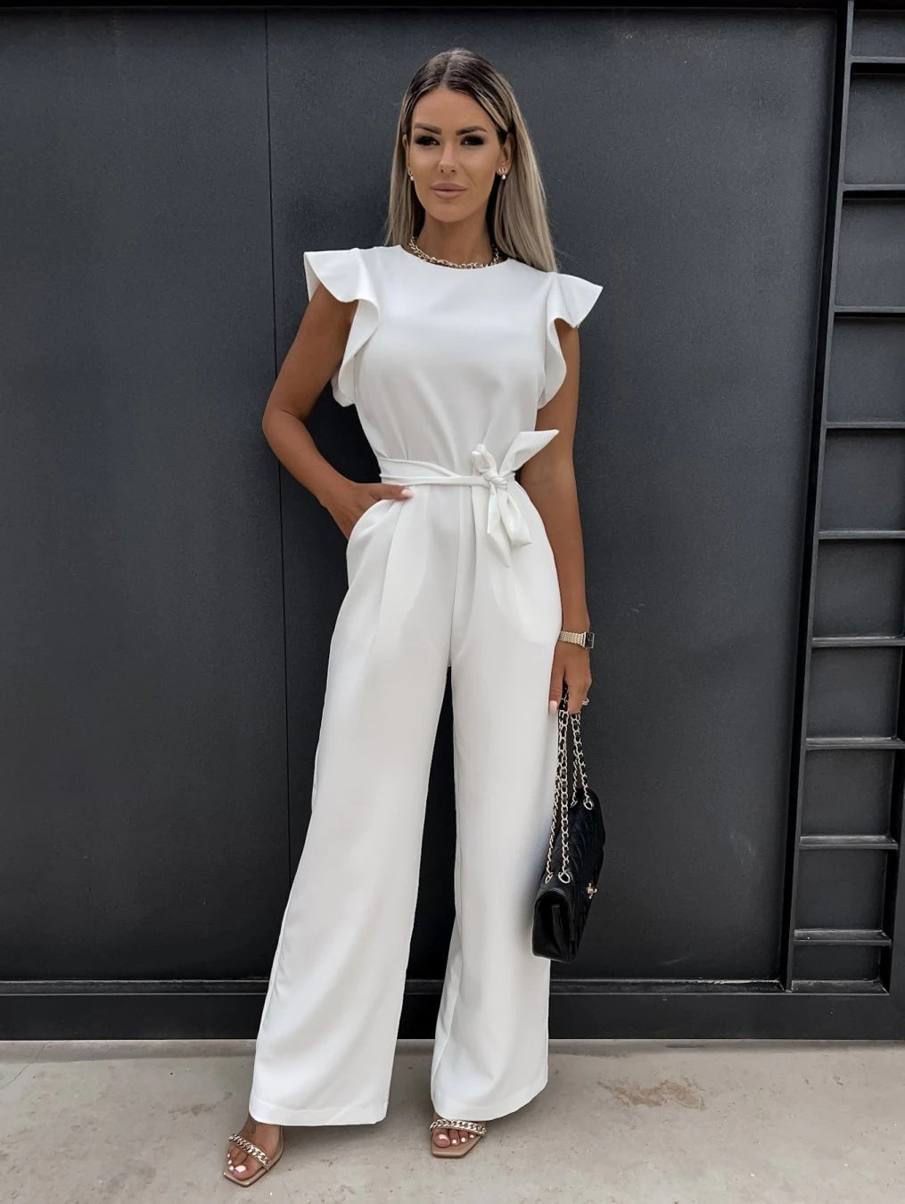 Dame elegant jumpsuit med volantærmer og taljebælte Stilla
