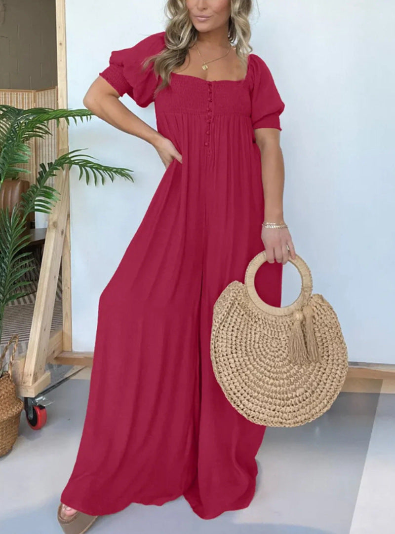 Dame afslappet jumpsuit med smalle stropper og knapdetalje Stilla