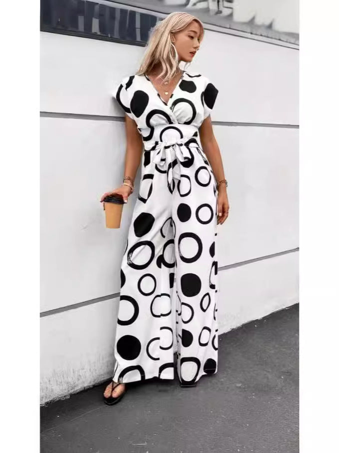 Dame Elegant Jumpsuit med iøjnefaldende mønster og smart bælte Stiila