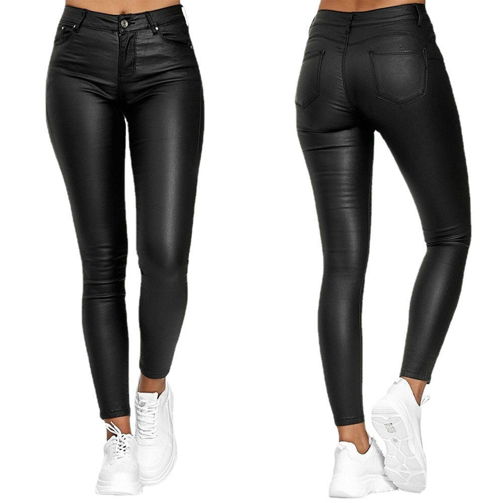 Dame lak leggings i skinny-fit stil med høj talje og praktiske lommer Stilla