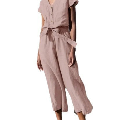 Dame let jumpsuit med taljebind og knapdetaljer Stilla