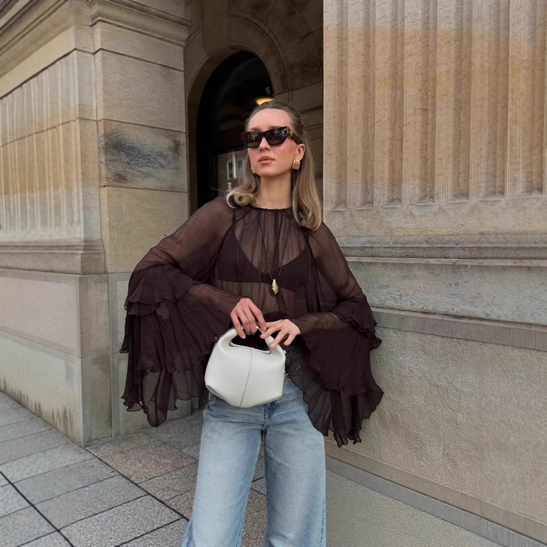 Dame Transparent Bluse med voluminøse flæsedetaljer og stilfuldt design Stilla