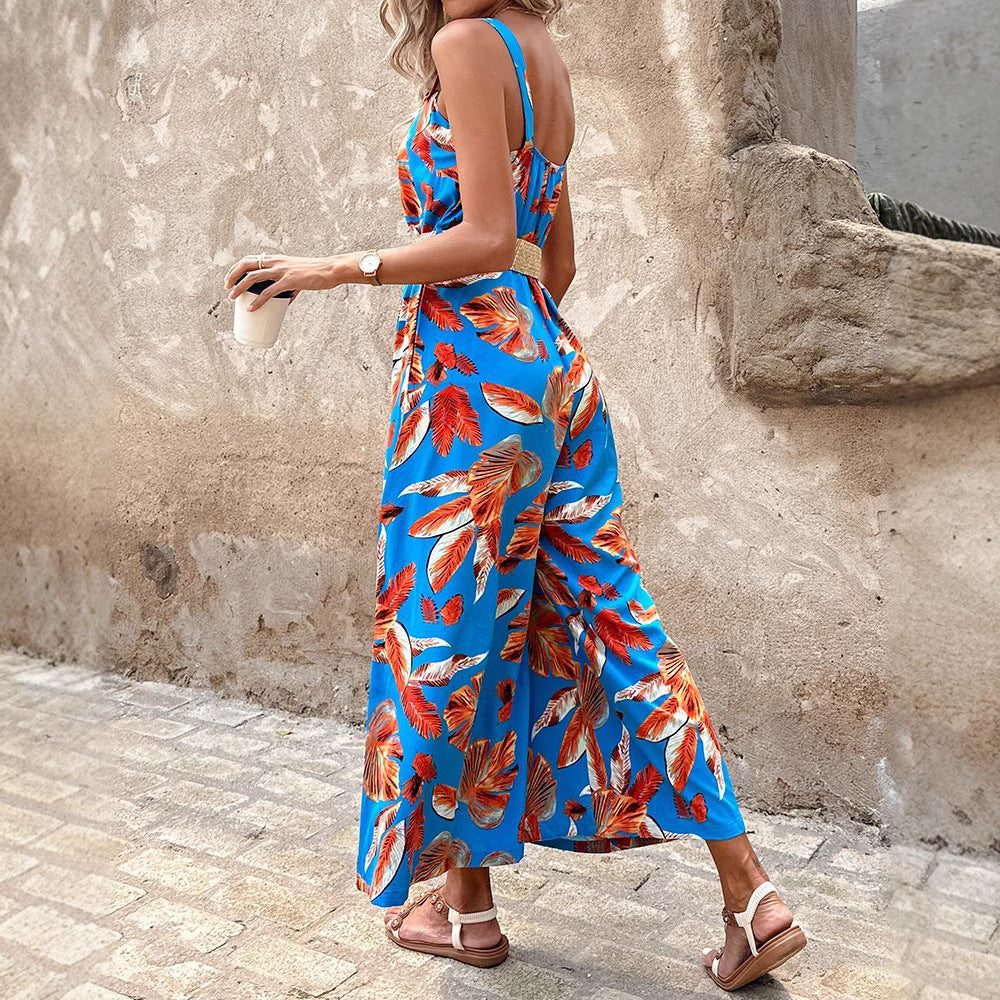 Dame maxijumpsuit med florale accenter og elastisk bånd Stilla