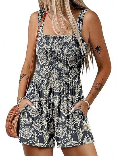 Dame jumpsuit med blomster mønster og praktiske lommer Stilla