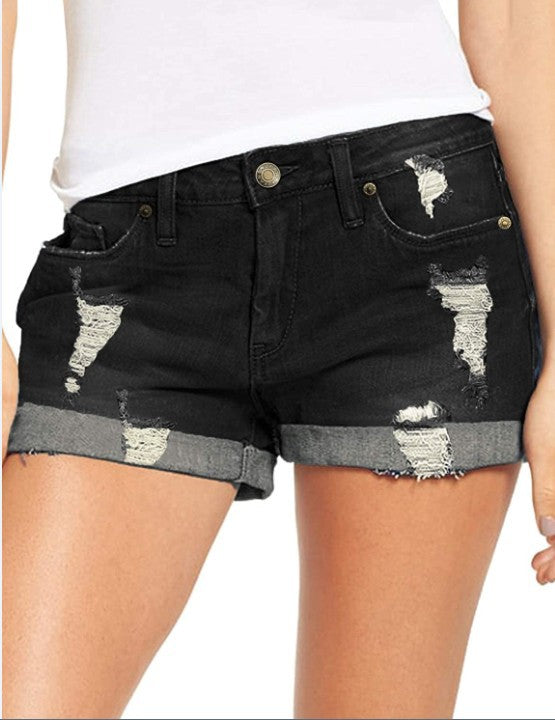 Dame Destroyed Denim-Shorts med omfoldet kant og trendy dekorationer Stilla