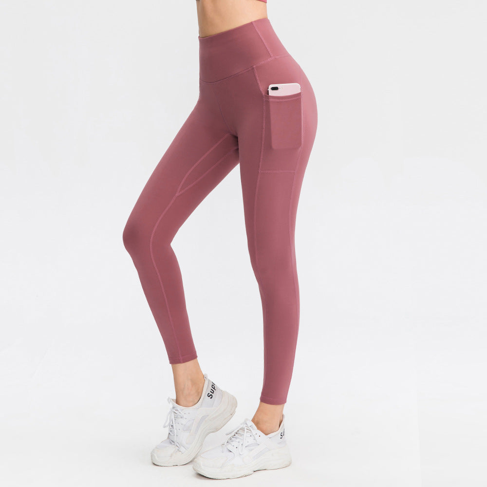 Dame højt skårne fitness leggings med praktiske sidelommer og fleksibelt materiale Stilla