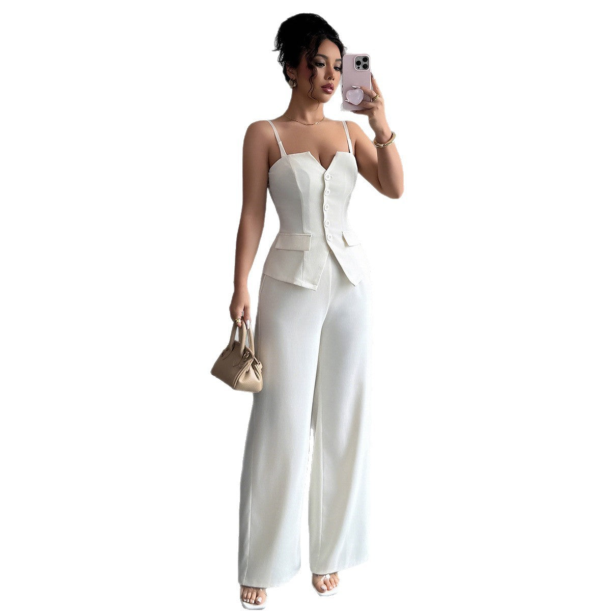 Dame Jumpsuit med elegant knaplukning og figursyet overdel Stilla