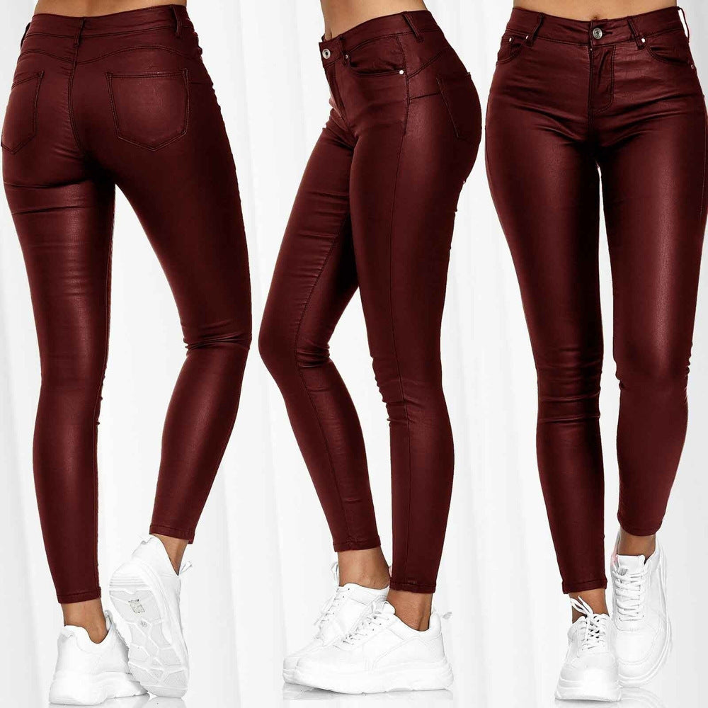 Dame lak leggings i skinny-fit stil med høj talje og praktiske lommer Stilla