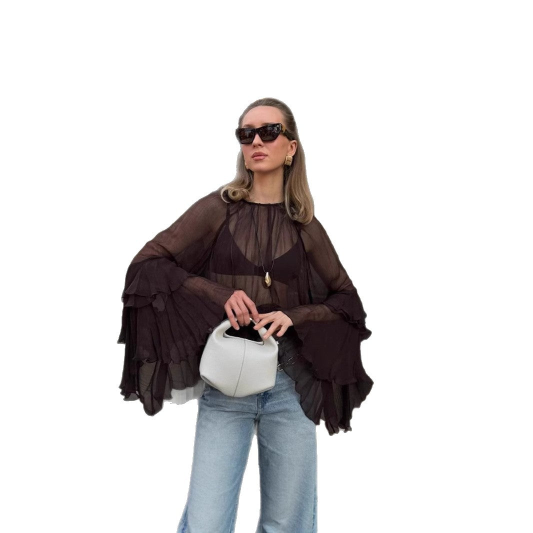 Dame Transparent Bluse med voluminøse flæsedetaljer og stilfuldt design Stilla