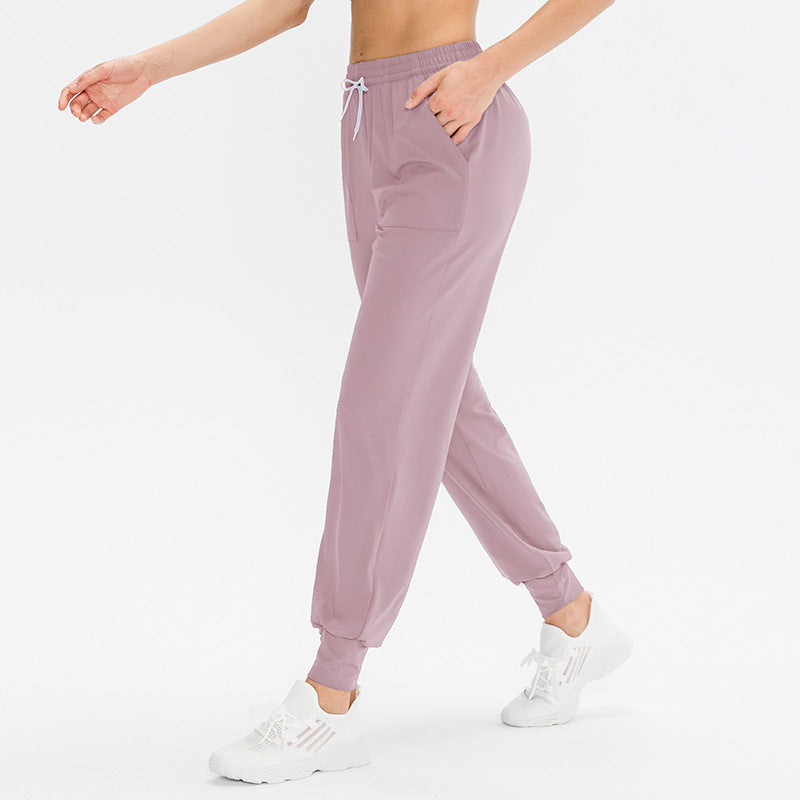 Dame Sporty Joggingbukser med praktiske lynlåslommer og fleksibel talje Stilla