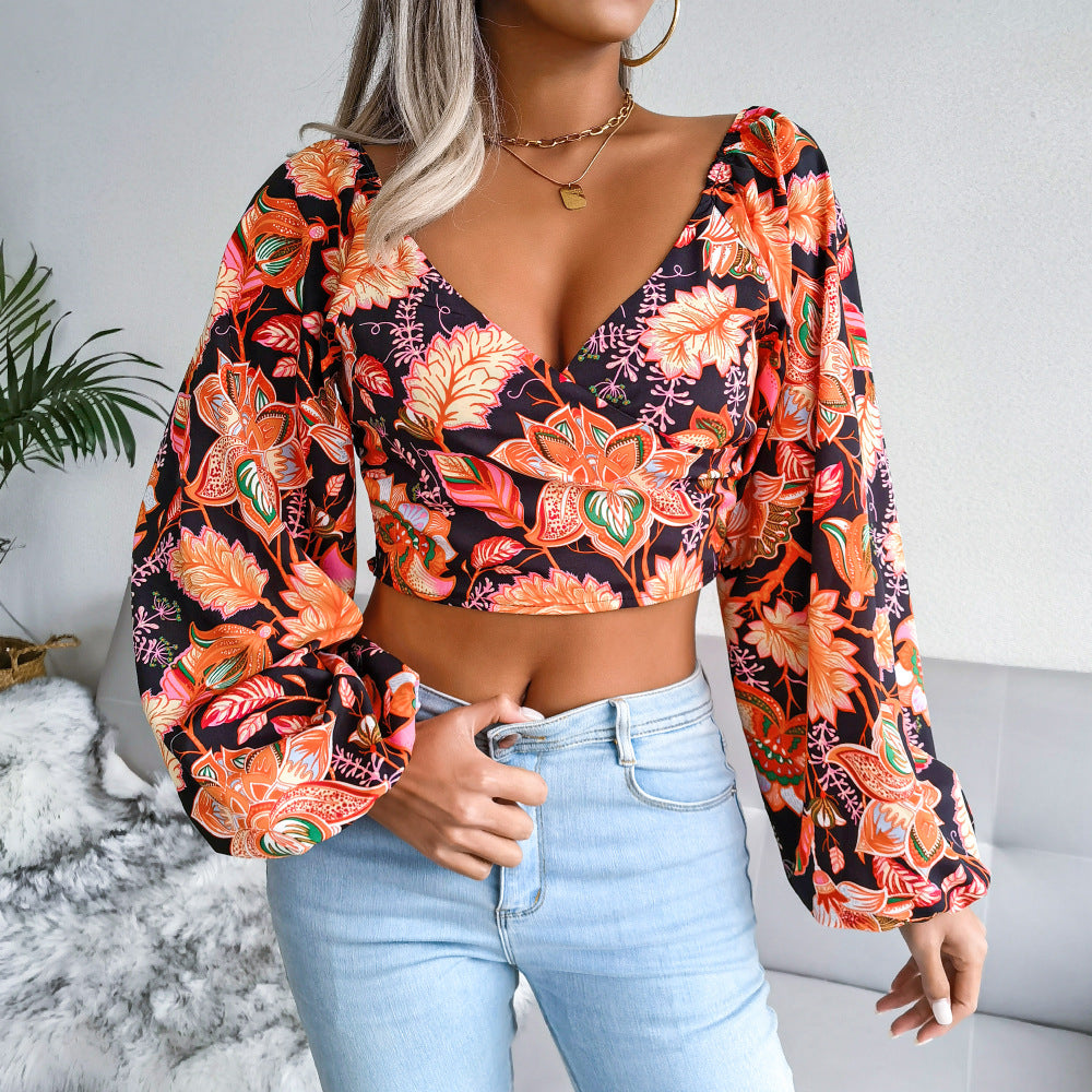 Dame Cropped Bluse med farverigt blomstret design og pufærmer Stilla
