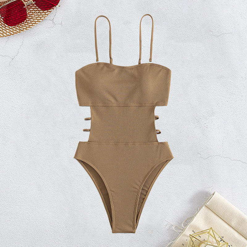 Dame jumpsuit badedragt med side cut-outs og justerbare spaghetti-stropper Stilla