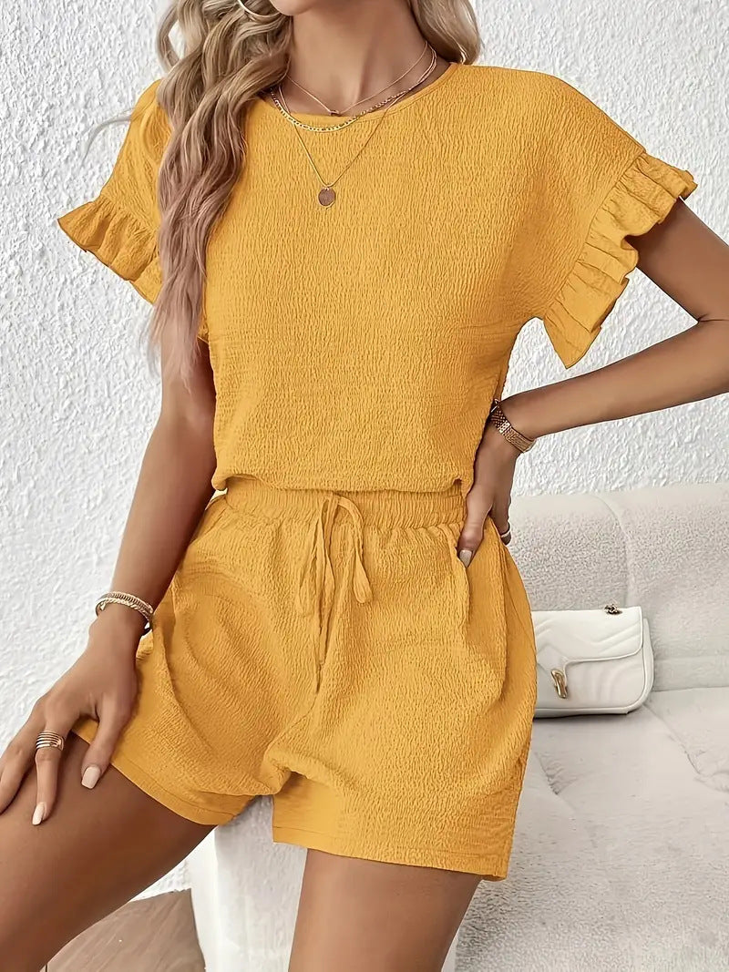 Dame luftig kort jumpsuit med flæsebesatte ærmer Stilla