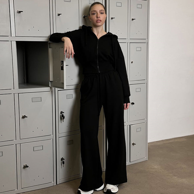 Dame Hoodie-jumpsuit med bred pasform og praktisk taljebælte Stilla