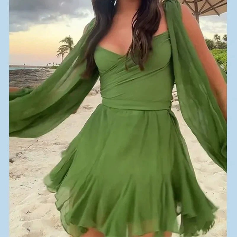 Dame jumpsuit med off-shoulder design og voluminøse ærmer Stilla