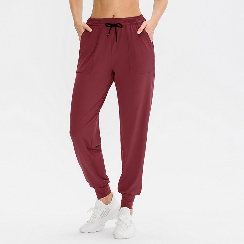 Dame Sporty Joggingbukser med praktiske lynlåslommer og fleksibel talje Stilla